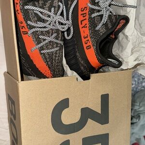 Adidas Black and Orange Sneakers with Primeknit Upper